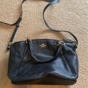 Coach leather purse. It is really soft. Gently used, still in great condition.